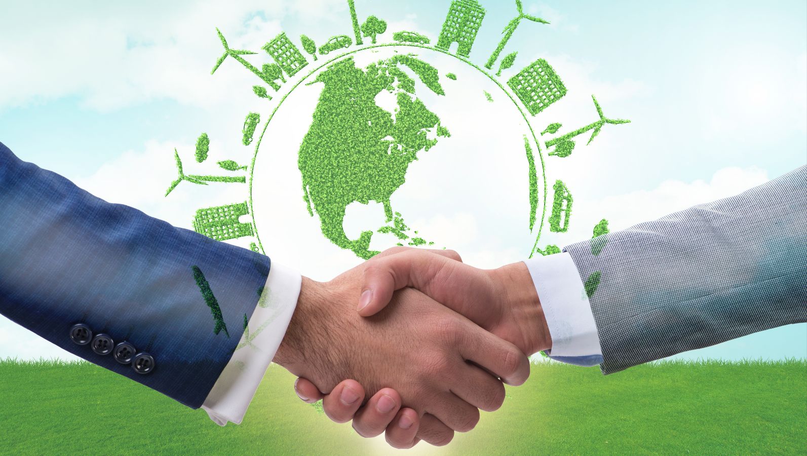 Zwei sich schüttelnde Hände von zwei Geschäftsleuten im Vordergrund. Im Hintergrund eine grüne Weltkugel mit grünen Symbolen von Energie, Windrktaft usw.